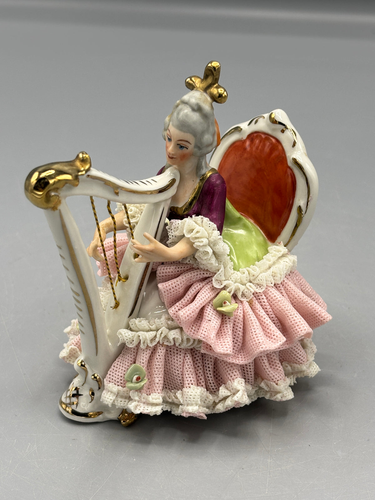 Vintage Dresden porcelain lady playing harp