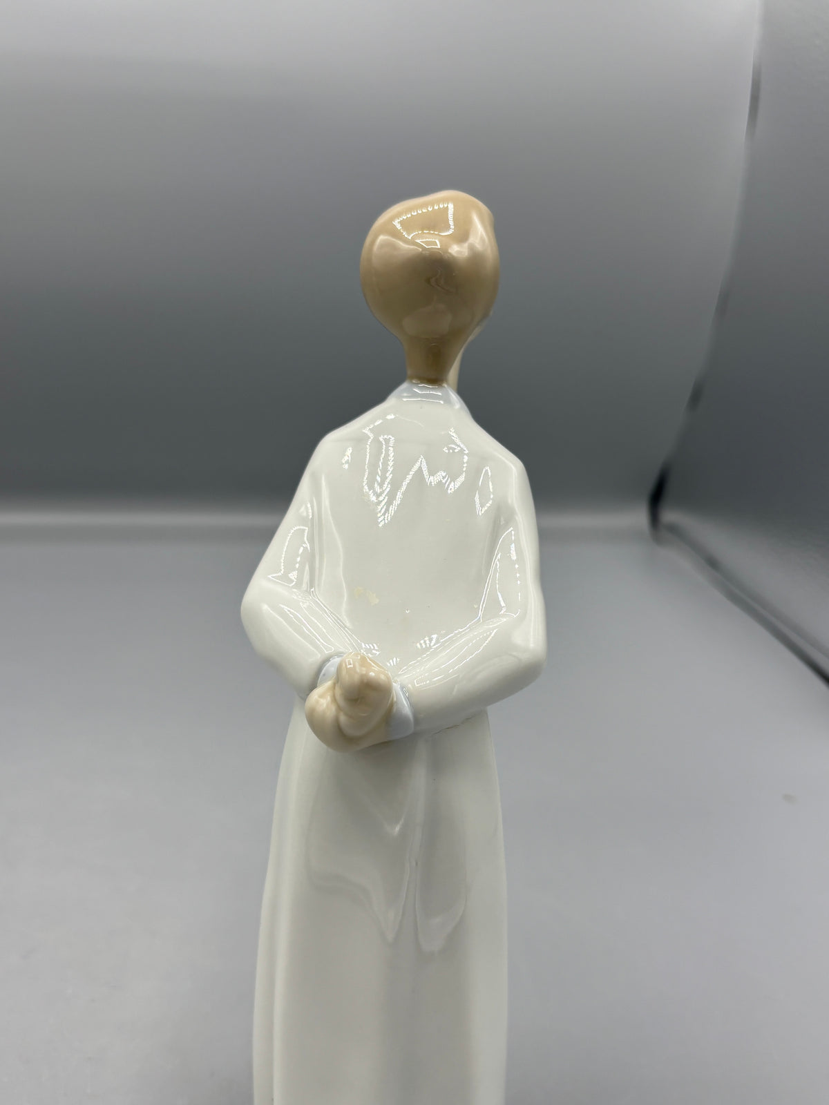 Vintage Lladro boy Blowing a kiss
