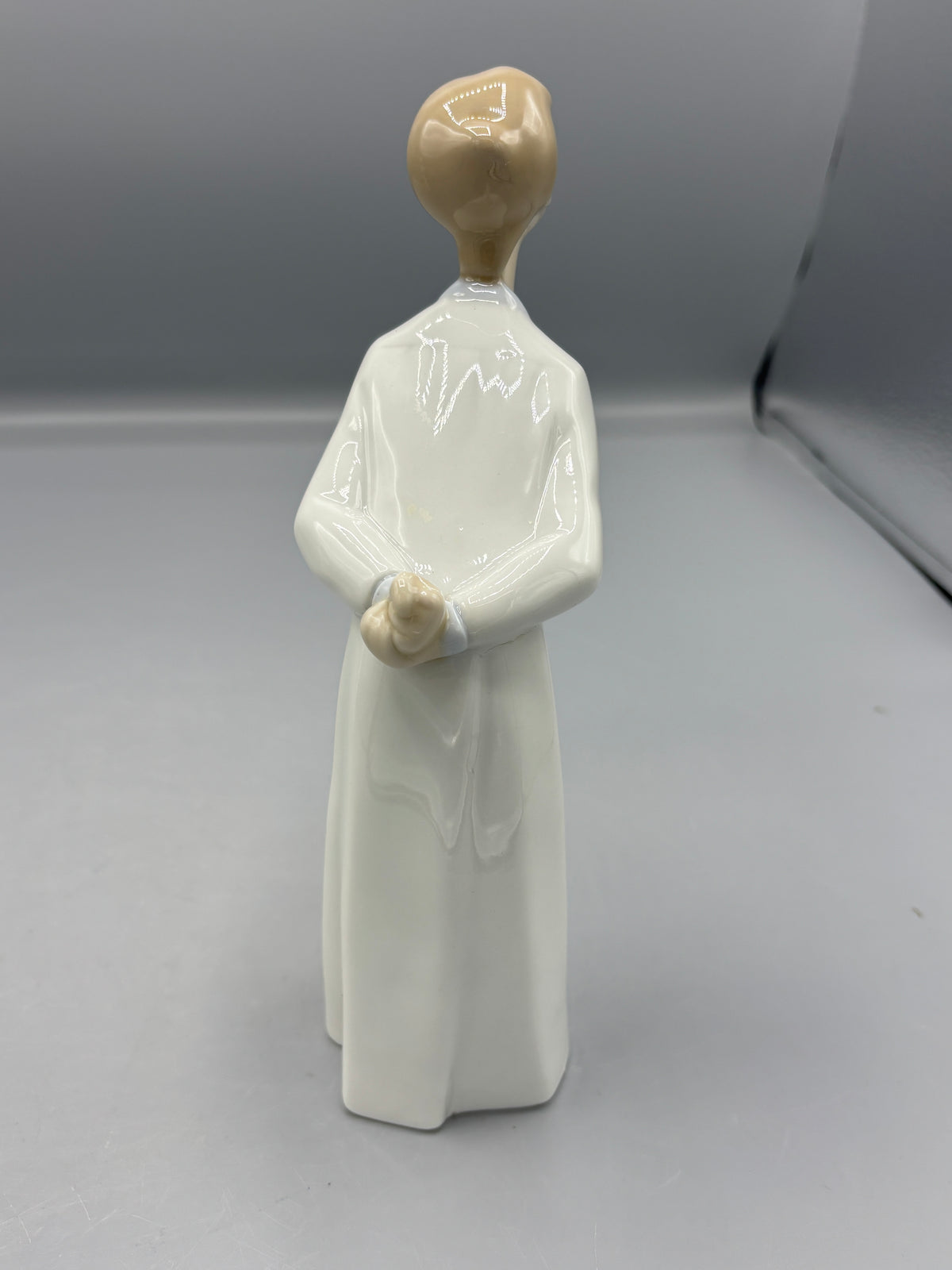 Vintage Lladro boy Blowing a kiss