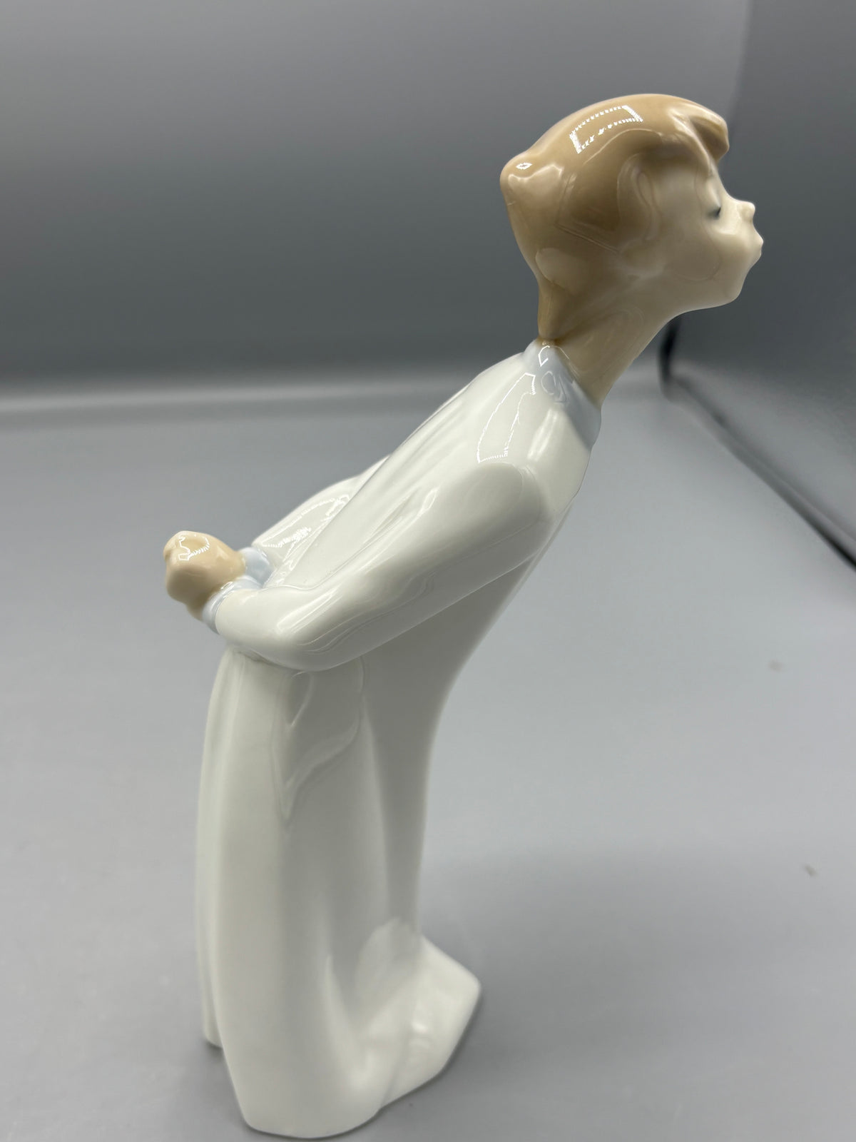 Vintage Lladro boy Blowing a kiss