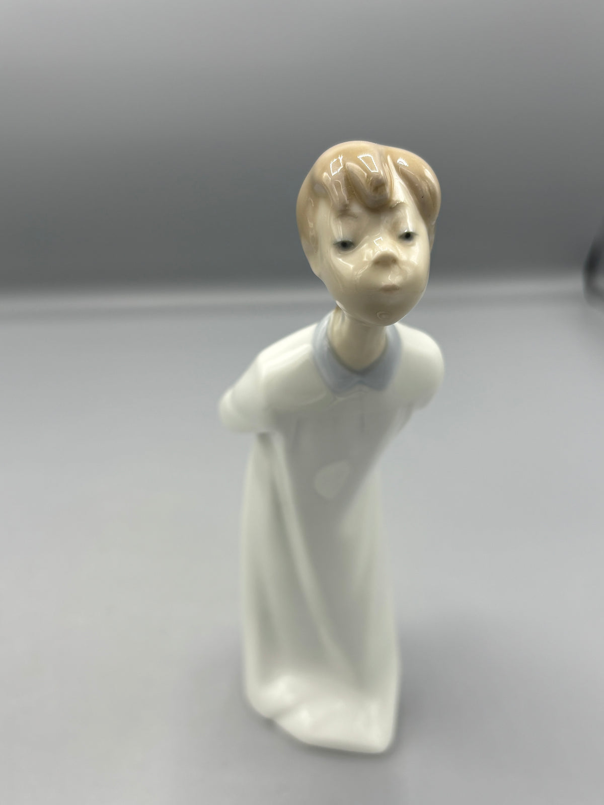 Vintage Lladro boy Blowing a kiss