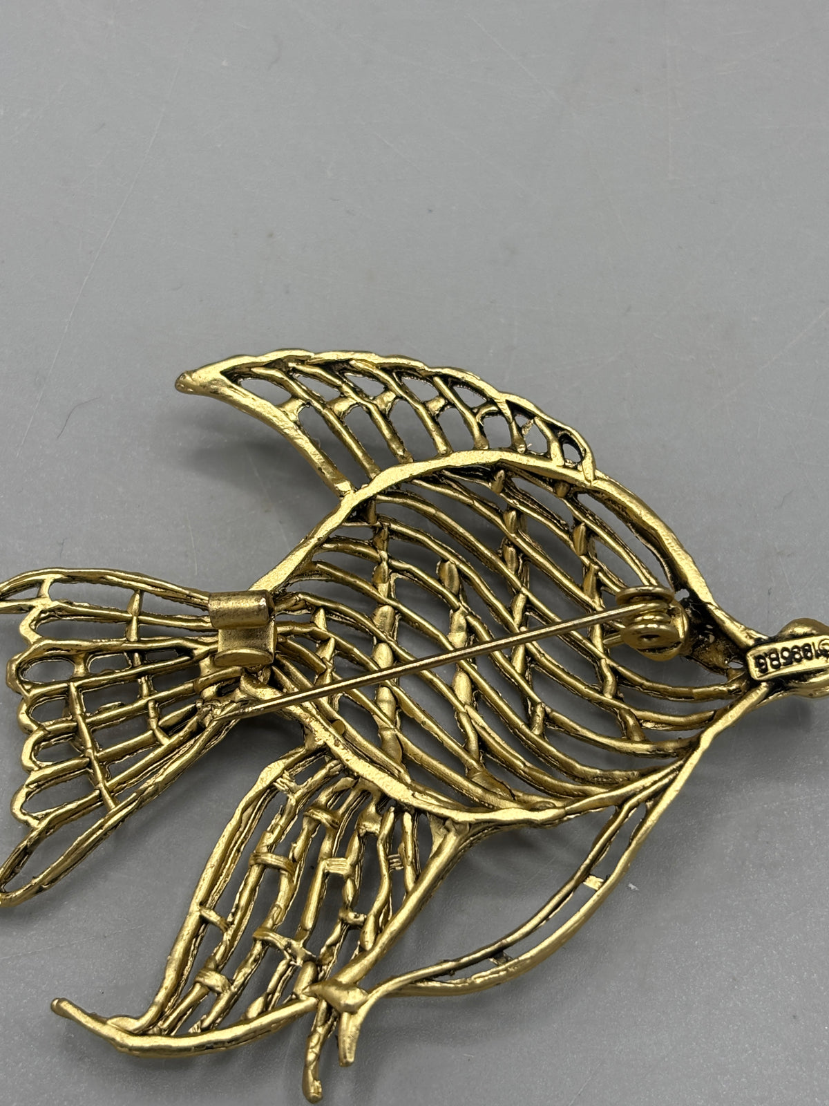 Vintage gold tone goldfish brooch
