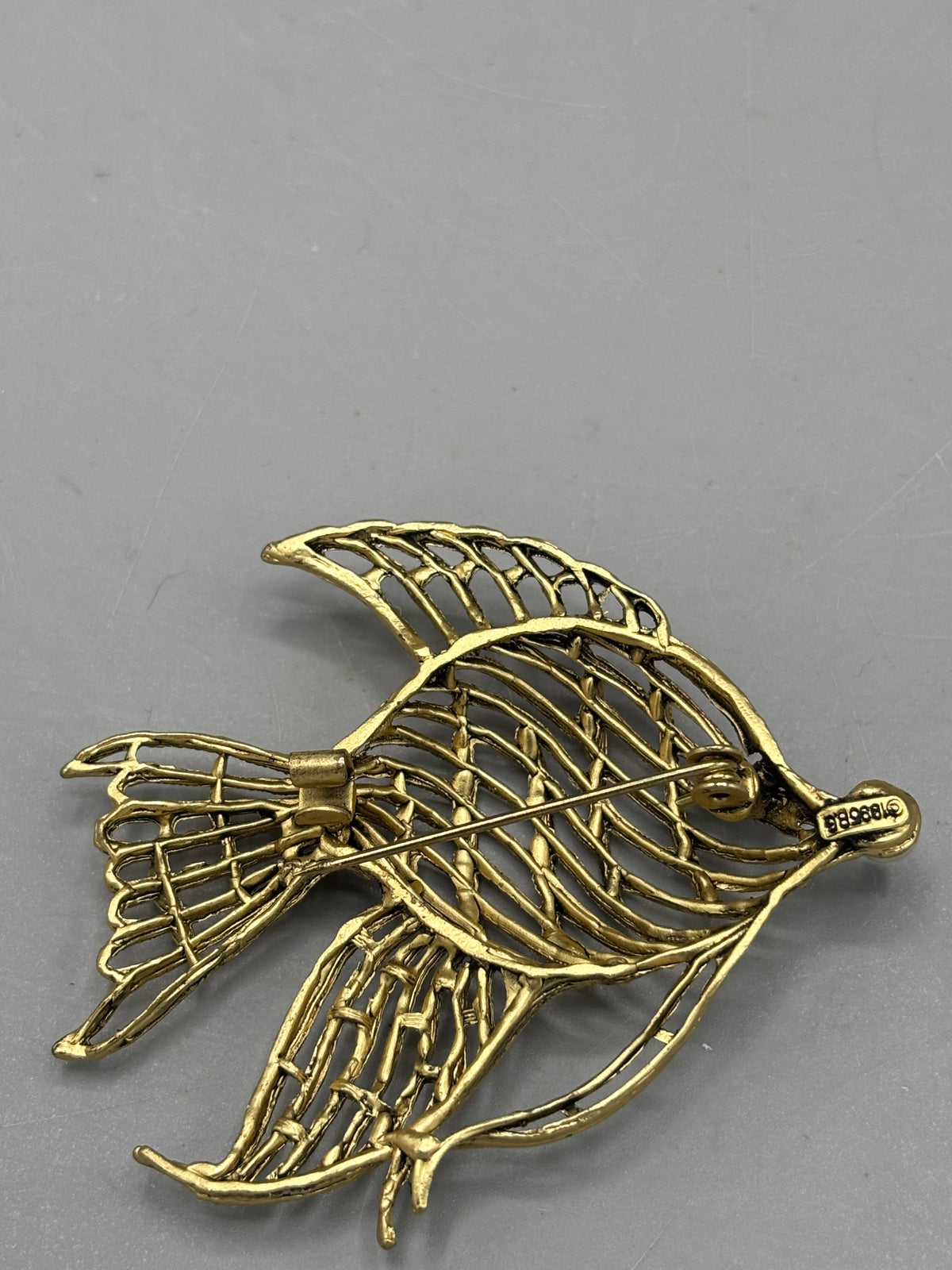 Vintage gold tone goldfish brooch
