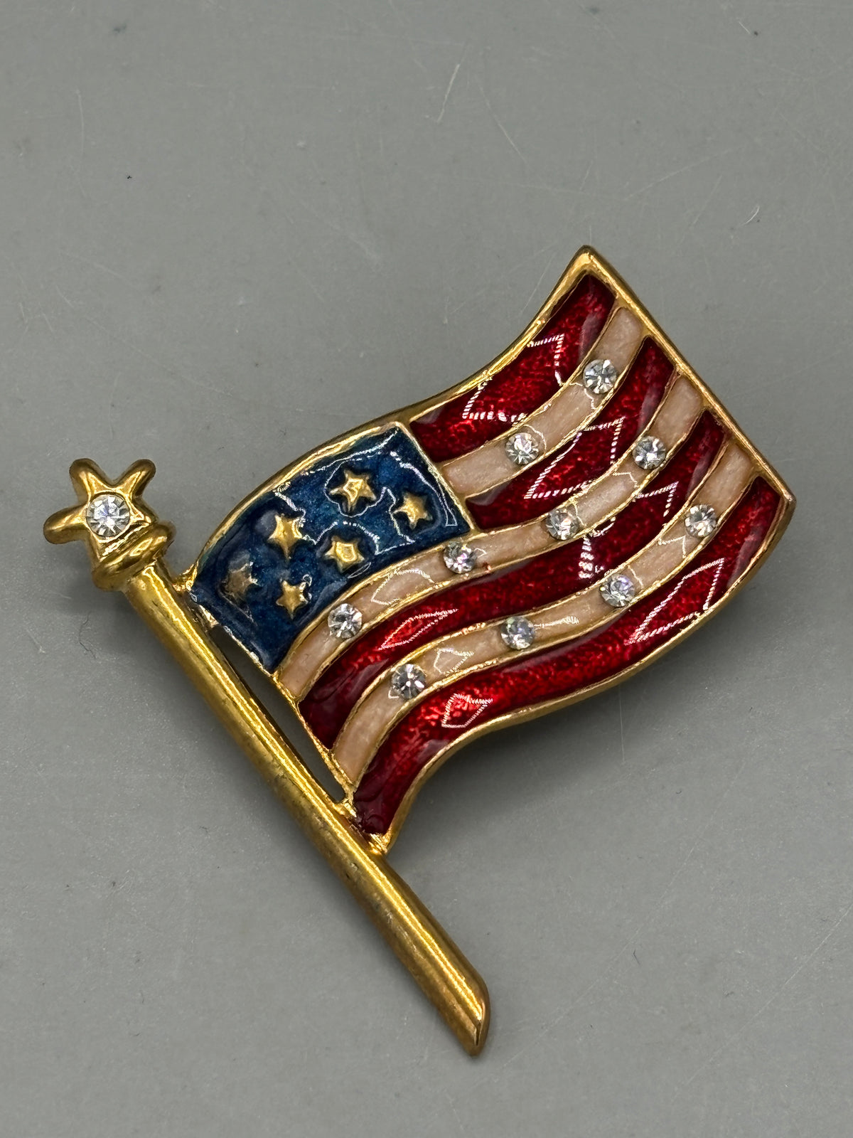 Gold tone American flag brooch