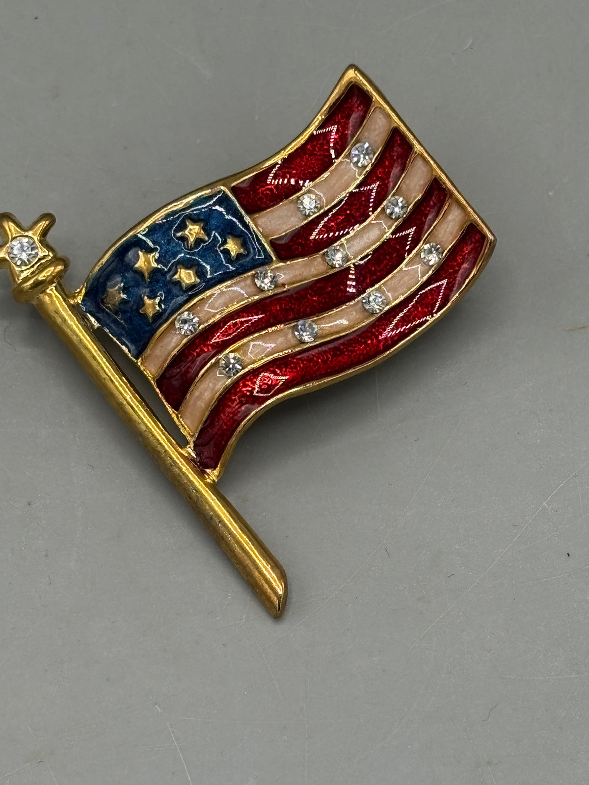 Gold tone American flag brooch