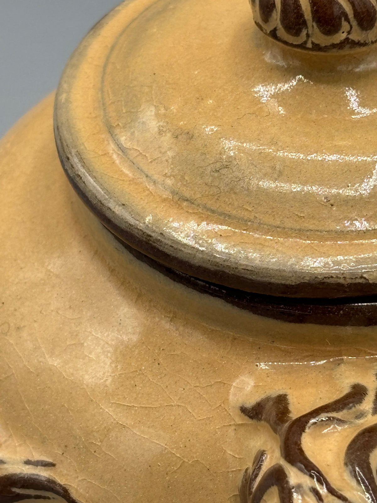 Light Tan ceramic teapot with animal design