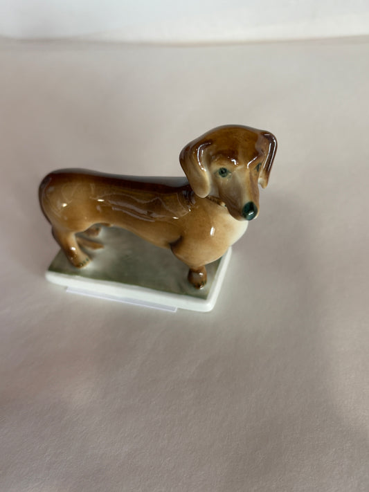 Vintage Zsolnag Hungary Dachsund Dog on Green Stand w/ Green Stamp