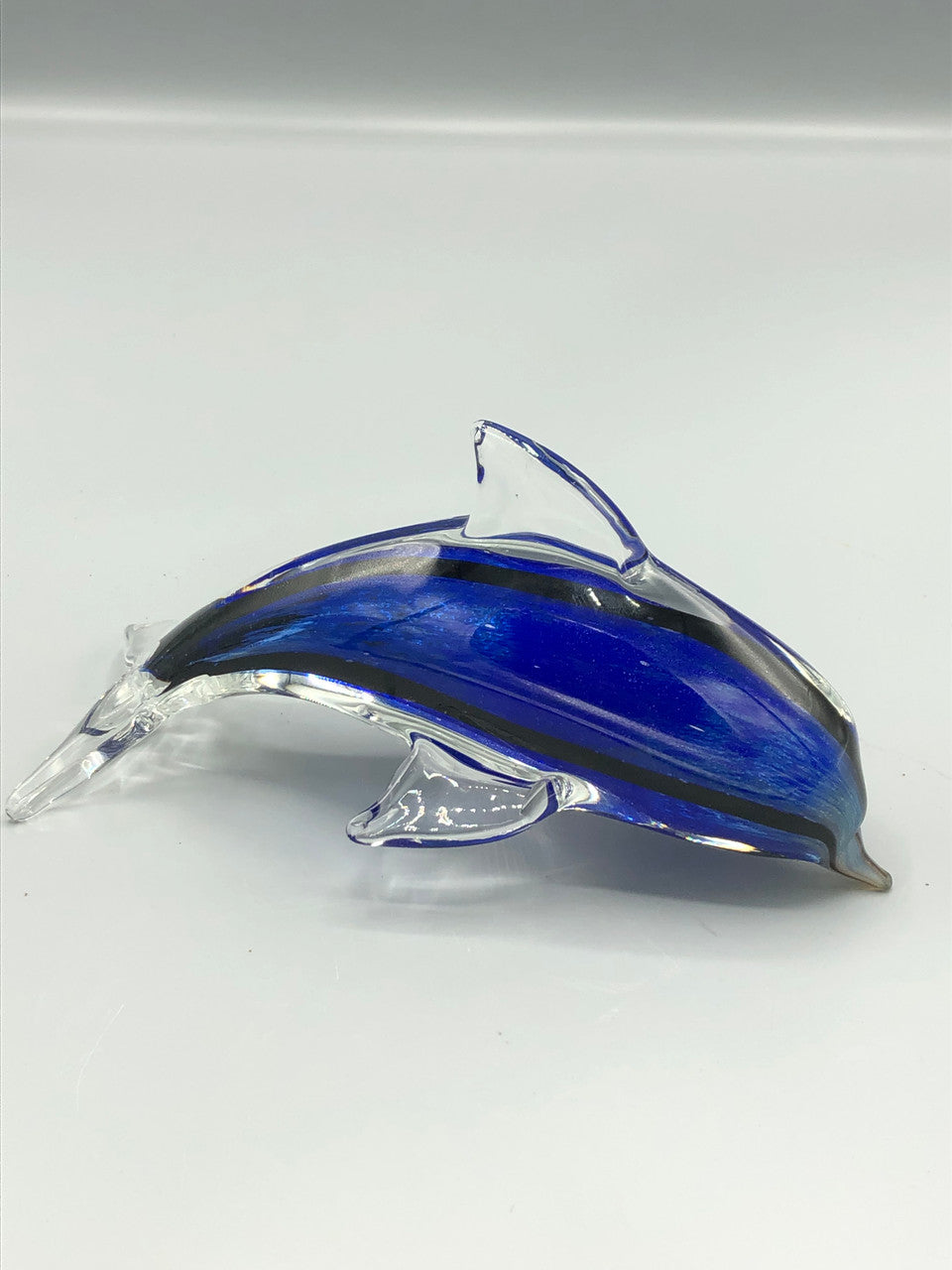 Blue glass dolphine figure