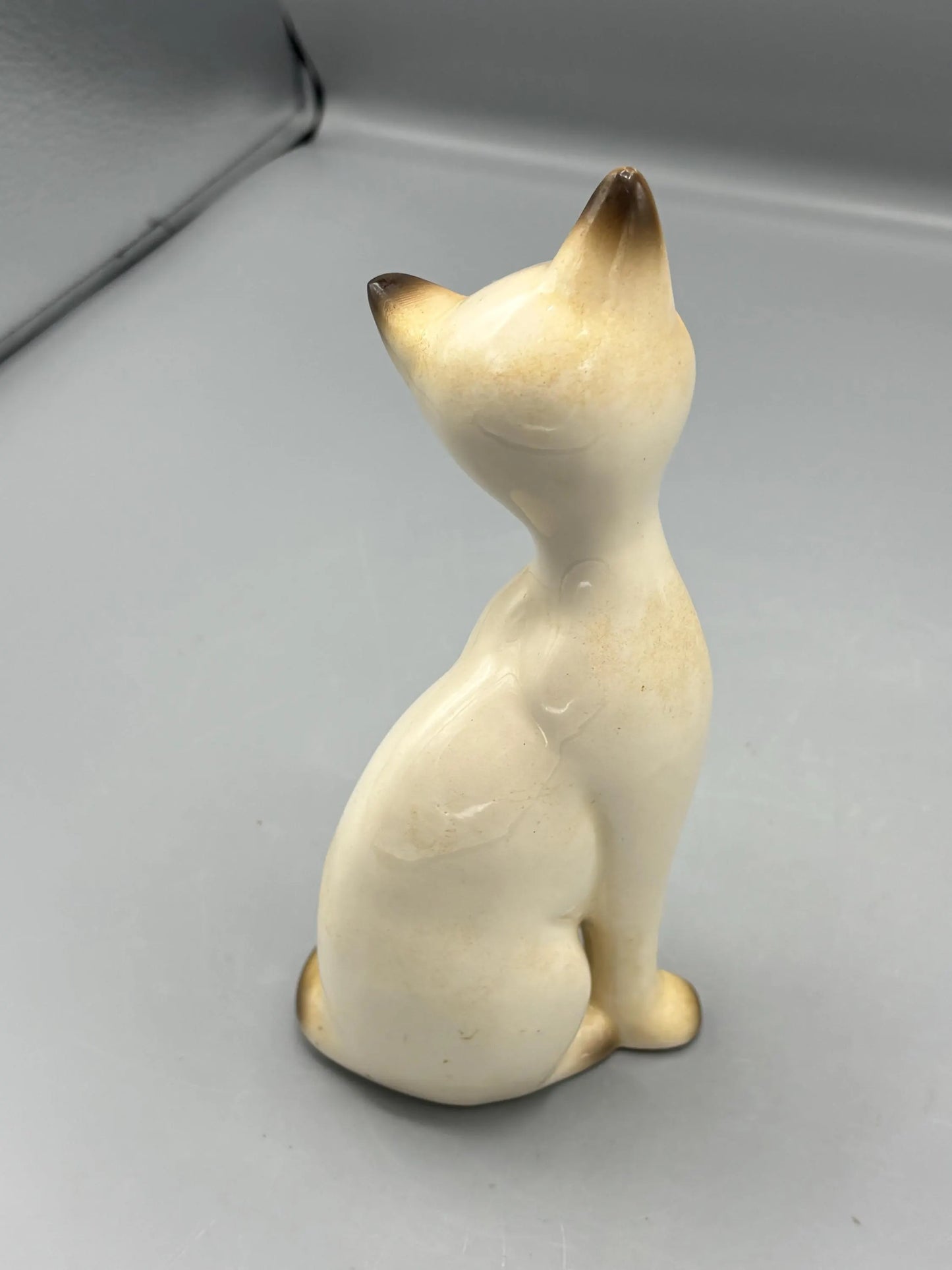 Napcoware ceramic ceramic sitting cat with painted eyelashes