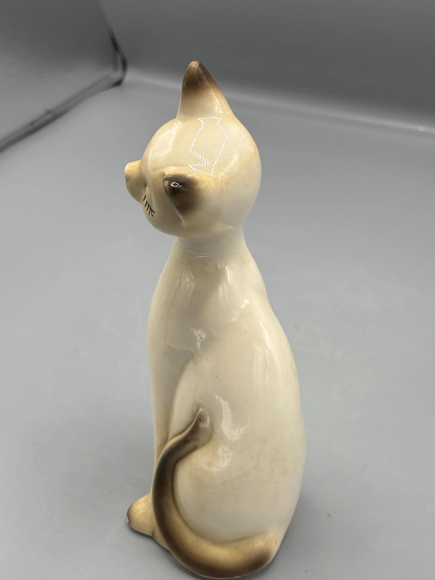Napcoware ceramic ceramic sitting cat with painted eyelashes